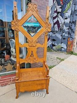 Victorian Antique Seated tiger oak mirrored Hall tree with north wind face hooks