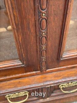 Victorian heavily carved tiger oak two door bookcase 1880 gilt quartersawn