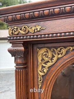 Victorian heavily carved tiger oak two door bookcase 1880 gilt quartersawn