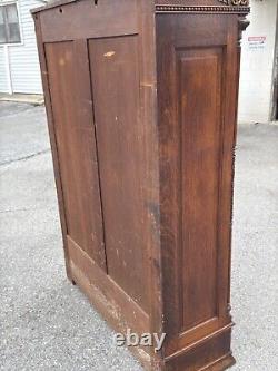 Victorian heavily carved tiger oak two door bookcase 1880 gilt quartersawn