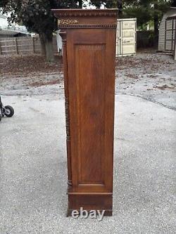 Victorian heavily carved tiger oak two door bookcase 1880 gilt quartersawn