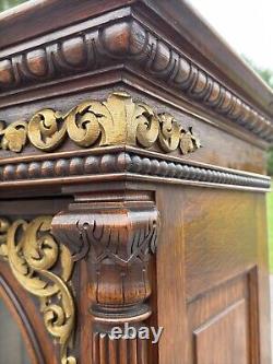 Victorian heavily carved tiger oak two door bookcase 1880 gilt quartersawn