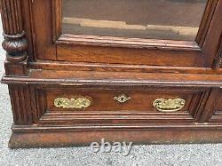 Victorian heavily carved tiger oak two door bookcase 1880 gilt quartersawn