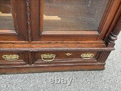 Victorian heavily carved tiger oak two door bookcase 1880 gilt quartersawn