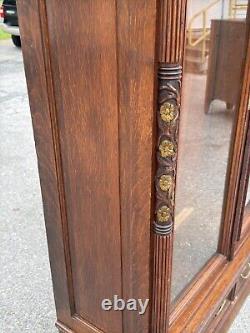 Victorian heavily carved tiger oak two door bookcase 1880 gilt quartersawn