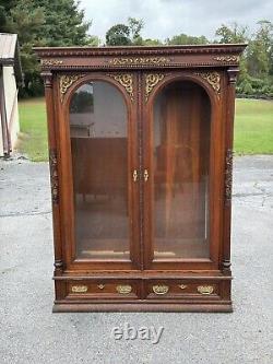 Victorian heavily carved tiger oak two door bookcase 1880 gilt quartersawn