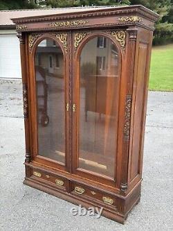 Victorian heavily carved tiger oak two door bookcase 1880 gilt quartersawn