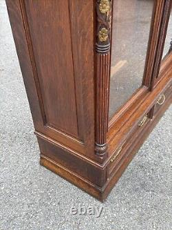 Victorian heavily carved tiger oak two door bookcase 1880 gilt quartersawn