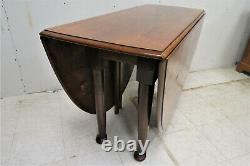 Vintage English Tiger Oak Drop Leaf Gate Leg Oval Dining Table