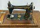 Vintage National Two Spool Treadle Sewing Machine Tiger Oak Cabinet