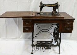 Vintage National TWO SPOOL Treadle Sewing Machine Tiger Oak cabinet