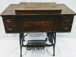 Vintage National TWO SPOOL Treadle Sewing Machine Tiger Oak cabinet